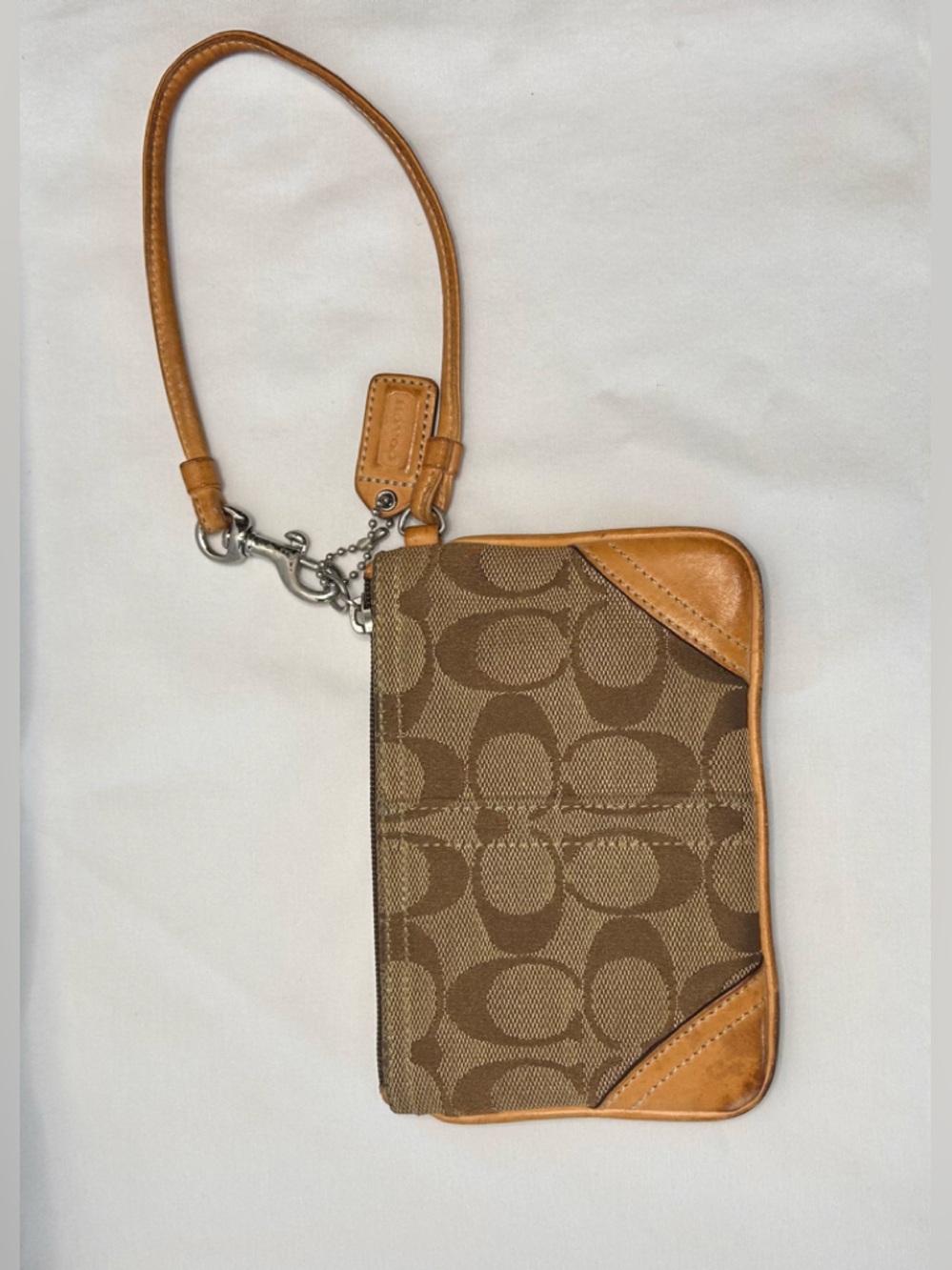 Coach Tan and Brown Signature Canvas Wristlet with Leather Trim.